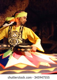 Egyptian man is dancing oriental dance