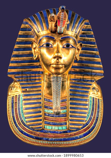 Egyptian pharaoh Tutankhamun\'s burial mask on\
blue background.