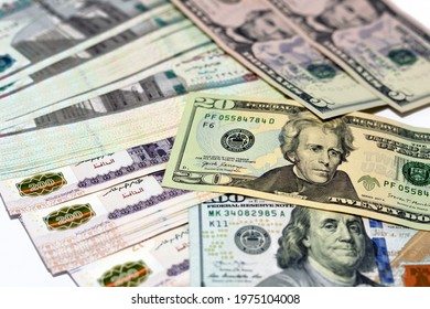 Egyptian pounds of 200 pounds and 100 Egyptian pounds with American money of 100 dollars bill, 20 dollars and 5 dollars background, Egypt and United States of America currency exchange rate