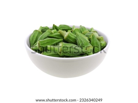 Egyptian small Okra in White bowl isolated on white background green okra short size