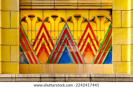 Egyptian style art deco tiles with flowers and pyramids outside Carlton Cinema, Islington, London