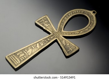 Egyptian symbol of life Ankh on nice silver black background