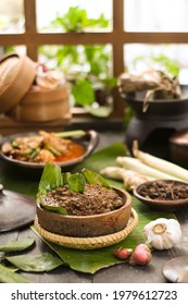 Eid Celebration. Indonesian Dish Of Rendang (beef Stew), Ayam Gulai (chicken Curry) And Ketupat (rice Cake)