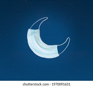 Eid moon shaped by face mask. Eid mubarak concept for 2021. Covid19 situation Eid or Ramadan celebration concept. Celebrate eid at home and wear face mask. - Powered by Shutterstock