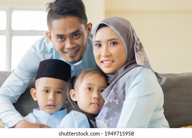 Eid Mubarak Aidilfitri Celebration Moment, Malay Family Close Up. Photo Together Wearing Traditional Cloth.