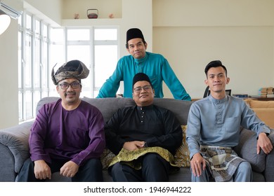 Eid Mubarak Celebration Concept, Group Photo Of Malaysian Wearing Traditional Clothes