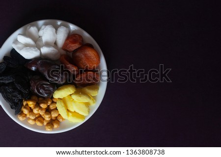 Eid Mubarak. Different iftar sweets. Celebrating Eid Al Adha. Islamic traditional holiday. Eid al-Fitr. Holly Ramadan. Middle East religious holiday. Iftar table decorated dried date fruit and sweets.