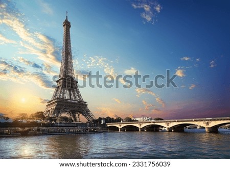Eiffel Tower and bridge Iena on the river Seine in Paris, France.