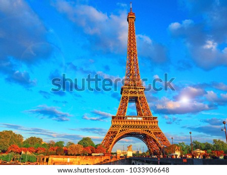 Eiffel Tower, bridge with sculpture on River Seine in Paris, France