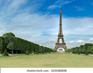 Eiffel Tower From Champ De Mars, Paris, France. Beautiful Romantic Background, No People