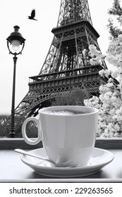 Eiffel Tower with cup of coffee in black and white style,  Paris, France