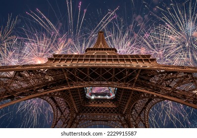 Eiffel tower with fireworks at night  in Paris, France. The Eiffel tower is the most visited touristic attraction in France - Powered by Shutterstock