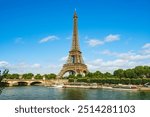 Eiffel Tower at the left bank of Seine river in Paris, France