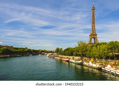 Eiffel Tower At Left Bank Of Seine River In Paris, France