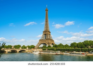 Eiffel Tower at the left bank of Seine river in Paris, France