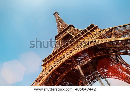 Eiffel Tower with lens flare and copy space.