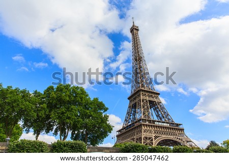 Eiffel Tower in summer on blue sky