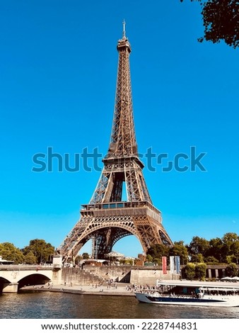 Similar – Eiffel Tower in summer on blue sky