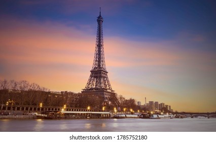  Eiffel tower in Paris, France with Scenic panorama of the river Seine under the twilight skyline with port of Seine river