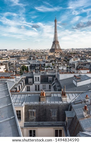 Similar – View of Paris with Eiffel tower silhouette at sunset