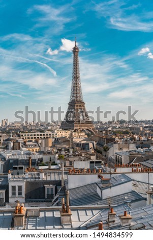 Similar – View of Paris with Eiffel tower silhouette at sunset