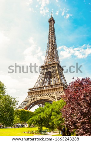 The Eiffel Tower in Paris on a beautiful sunny summer day