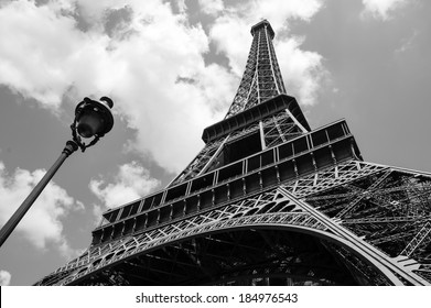Eiffel tower and parisian streetlight. Black and white.
