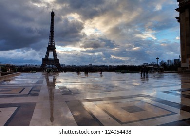 Eiffel Tower with reflection and clouds
