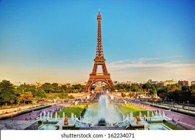 Eiffel Tower seen from fountain at Jardins du Trocadero at a sunny summer day, Paris, France