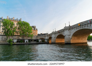 Eiffel Tower and Seine riverbank, low angle view, Paris, France - Powered by Shutterstock