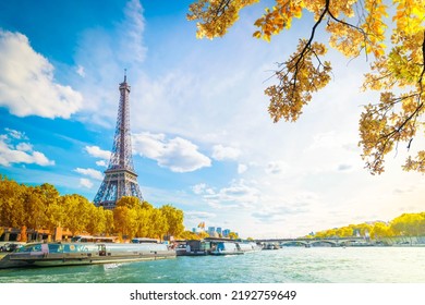 Eiffel Tower and Seine riverbank at summer day, Paris, France at fall with sunshine