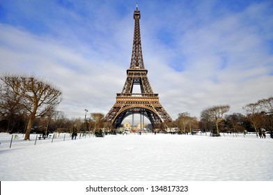 Eiffel Tower In The Snow On A Sunny Winter Day