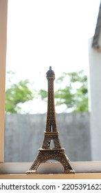 Eiffel Tower Souvenir On Window Sill