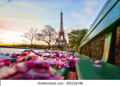 Eiffel Tower with spring leaves in Paris, France - Powered by Shutterstock