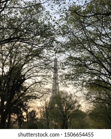 Eiffel Tower springtime through the trees