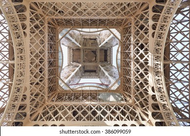 Eiffel tower structure under view in Paris, sunny day