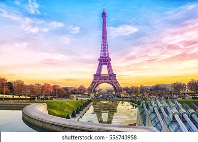 Eiffel Tower at sunset in Paris, France. Romantic travel background. - Shutterstock ID 556743958