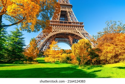 Eiffel Tower And Trees In Paris Park In Autumn