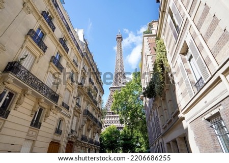 The Eiffel Tower view between palaces in Rue de l'Université street, 7th arrondissement, Paris, France