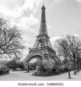Eiffel tower, view from Champ de Mars in Paris, France (black and white)