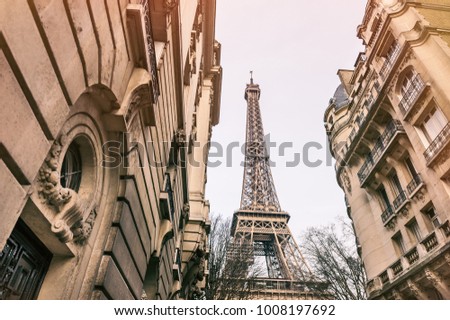 Eiffel Tower view from cozy street in Paris, France