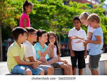 Eight Children Are Talking About Play On Walk In The Park