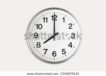 Eight O'Clock wall clock on white background