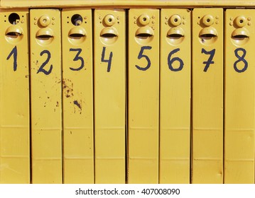 eight old mail boxes from one to eight