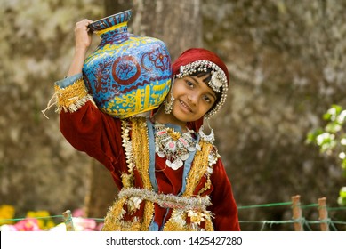 Eight Year Old Tourist Girl With Decorative Water Pot At Dehradun Uttarakhand India, Southeast, Asia,