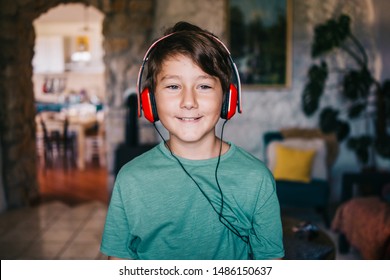 Eight Years Old Boy Listening Music