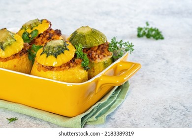 Eight-Ball zucchini stuffed with meat, bulgur and vegetables