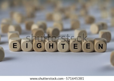 eighteen - cube with letters, sign with wooden cubes