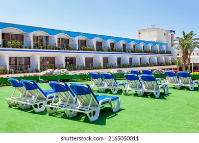 Eilat, Israel - May 25, 2009: Vacant Sunbeds For Sunbathing At Resort Hotel