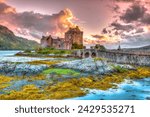 Eilean Donan Castle at sunset, Dornie, Kyle of Lochalsh in Scotland, United Kingdom. It is the most visited castle, situated on an island at the confluence of three sea lochs.